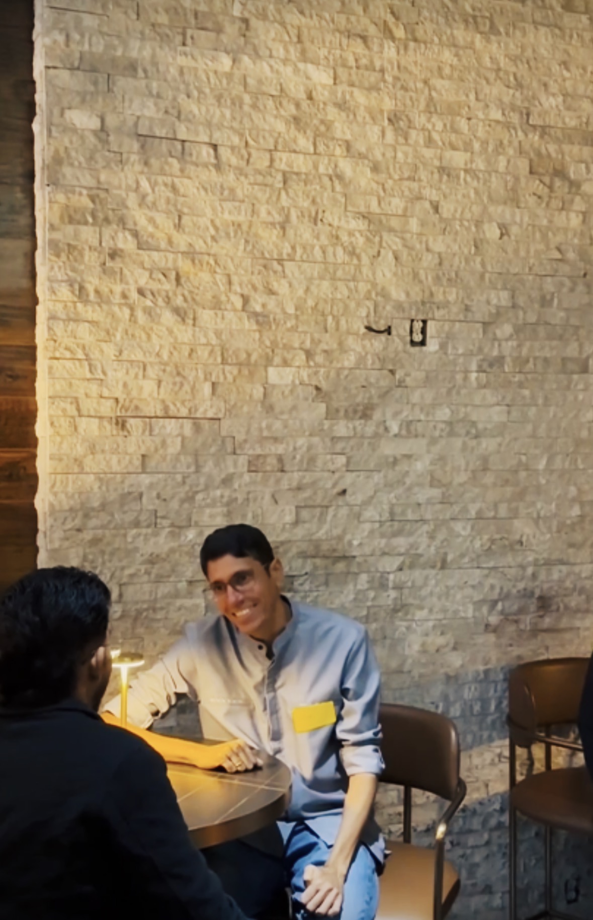 A founder laughing during a conversation
